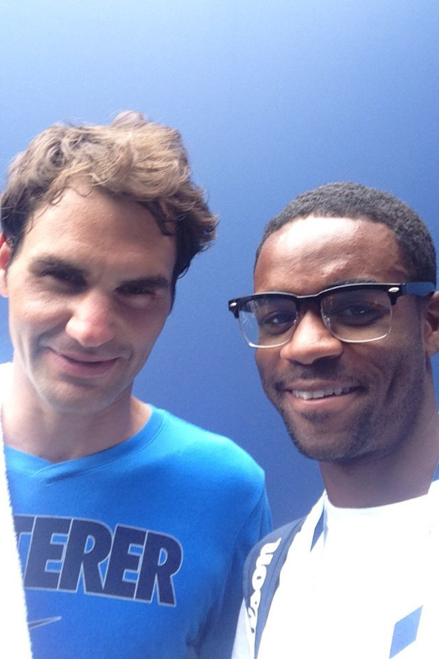 Elijah and Roger Federer after a private US Open practice session 